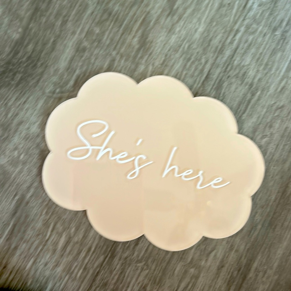 She’s here sign